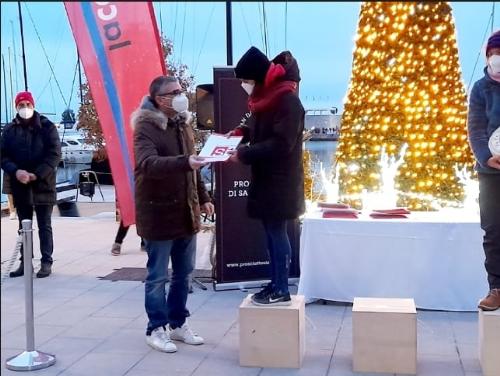 L'assessore regionale alle Autonomie locali Pierpaolo Roberti alle premiazioni della Corsa della Bora a Portopiccolo, in località Sistiana