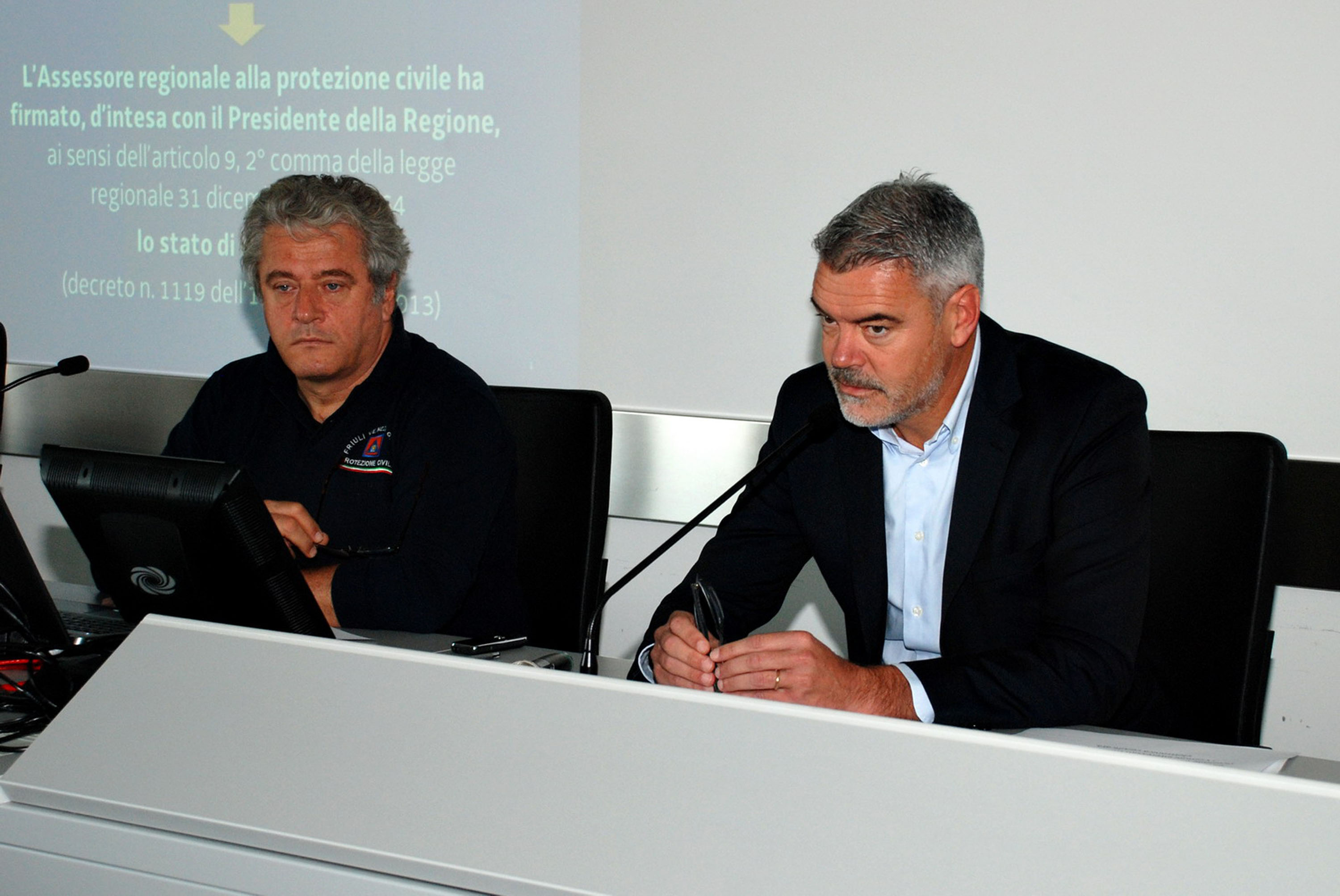 Guglielmo Berlasso (Direttore Protezione civile FVG) e Paolo Panontin (Assessore regionale Protezione civile) durante l'incontro con i sindaci dei territori comunali colpiti da maltempo tra l'8 e il 9 settembre 2013. (Palmanova 18/09/13)