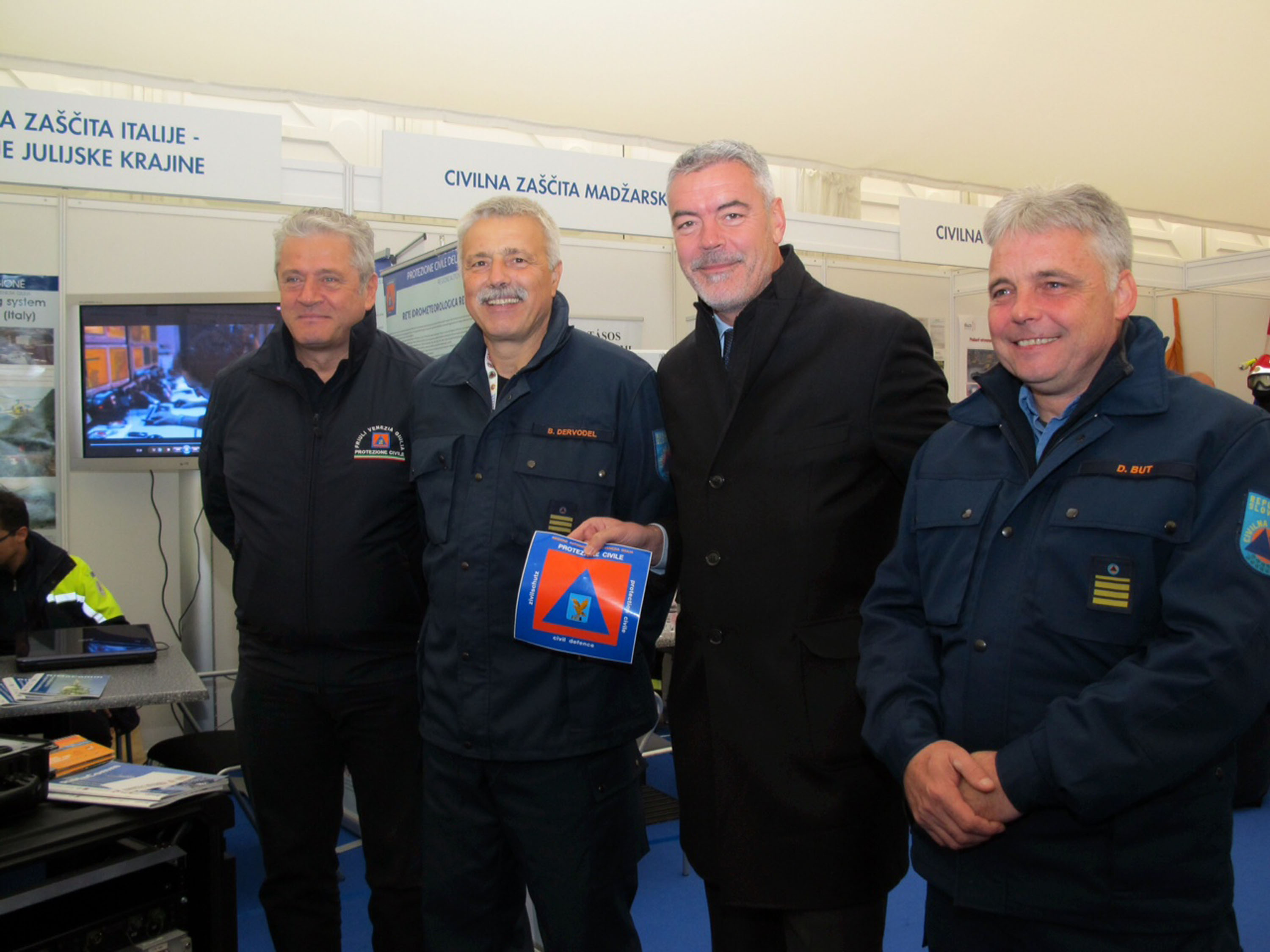 Guglielmo Berlasso (Direttore Protezione civile FVG), Branko Dervodel (Vicecapo Protezione civile SLO), Paolo Panontin (Assessore Protezione civile FVG) e Marko But (Capo Protezione civile SLO). [Velenje (SLO) 05/10/13]