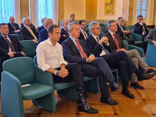 Il governatore Massimiliano Fedriga (a sinistra) all'incontro dei soci del Mib di Trieste