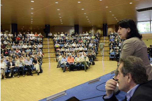 Mariagrazia Santoro (Assessore regionale Lavori pubblici) interviene al seminario "Costruire ai tempi del Patto di stabilità" sulle semplificazioni edilizie introdotte dalla legge regionale 13/2014, nell'Auditorium della Regione FVG - Udine 10/09/2014