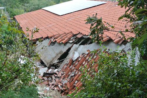 La casa colpita da una frana causata dal maltempo, sulla strada per Lazzaretto - Muggia (TS) 15/10/2014