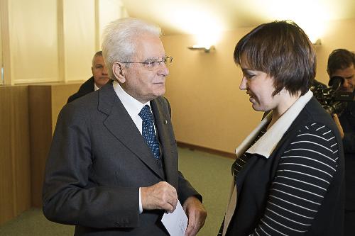 Sergio Mattarella (Presidente della Repubblica) con Stefania Collavin, vedova di Cristian Rossi, alla cerimonia di inaugurazione dell'Anno Accademico dell'Università di Udine - Udine 13/11/2017