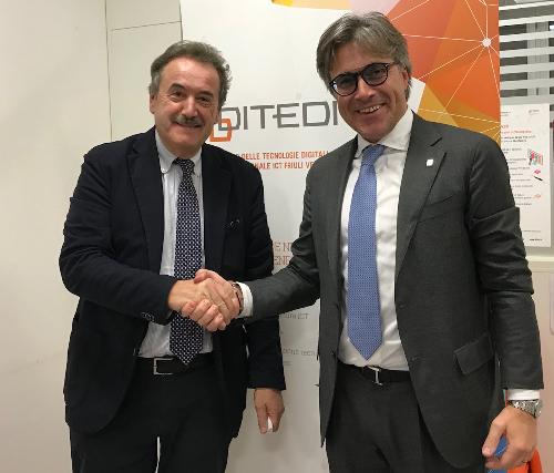 L'assessore alle Attività produttive del Fvg, Sergio Emidio Bini, con il presidente del Ditedi Mario Pezzetta in occasione della visita al distretto delle tecnologie digitali a Feletto Umberto.
