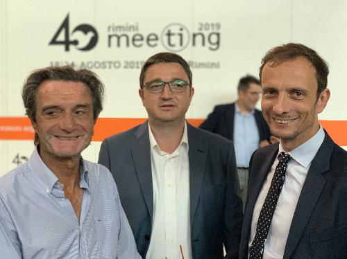 Il governatore Massimiliano Fedriga, al 40° Meeting di Rimini assieme al presidente della Regione Lombardia Attilio Fontana e al presidente della Provincia Autonoma di Trento, Maurizio Fugatti.
